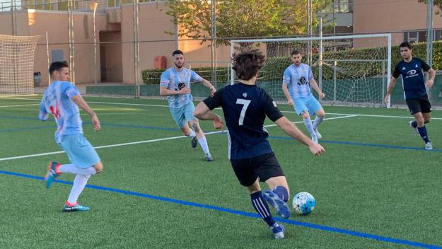 L'Atlètic Junior, en un partit davant la Penya Màlaga